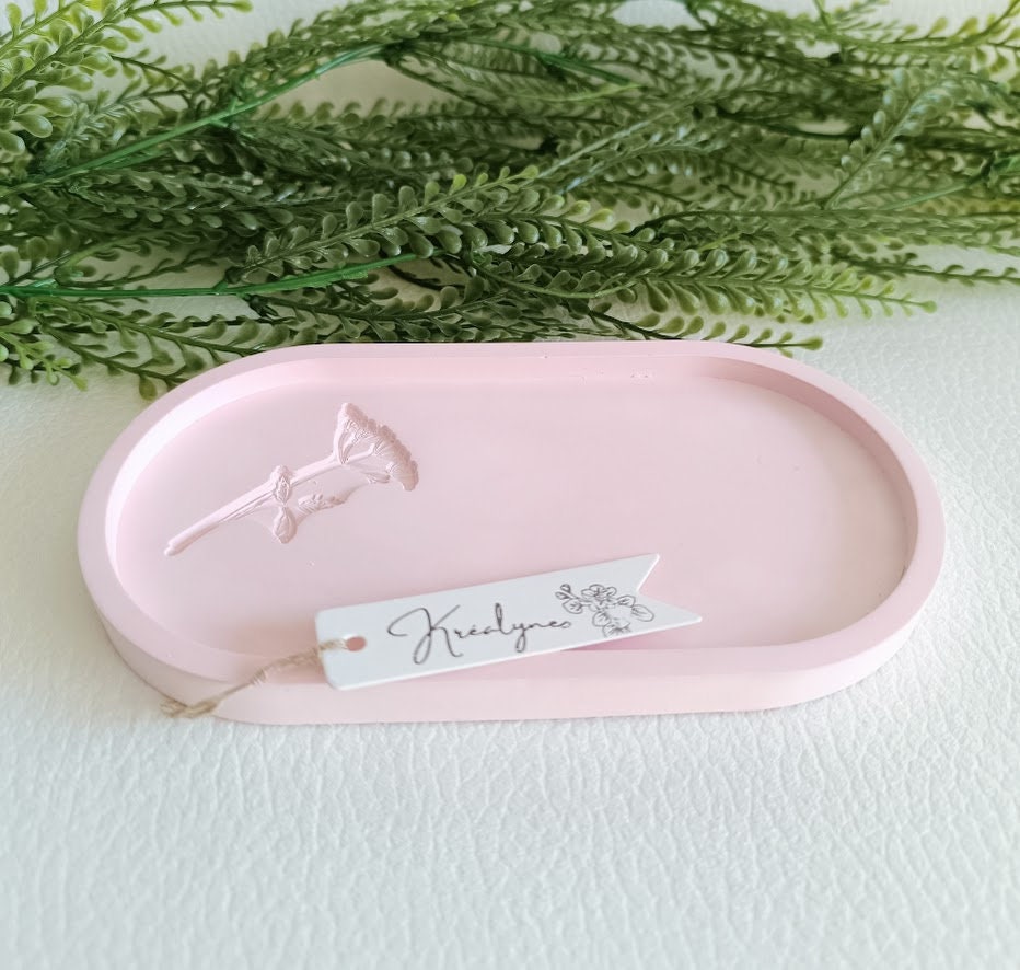 Plateau de rangement rose clair motif petite fleur.