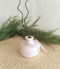 Petit vase diffuseur de parfum blanc et or