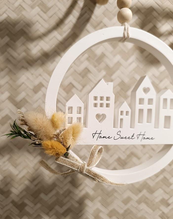 Décoration murale maisonnettes et fleurs séchées