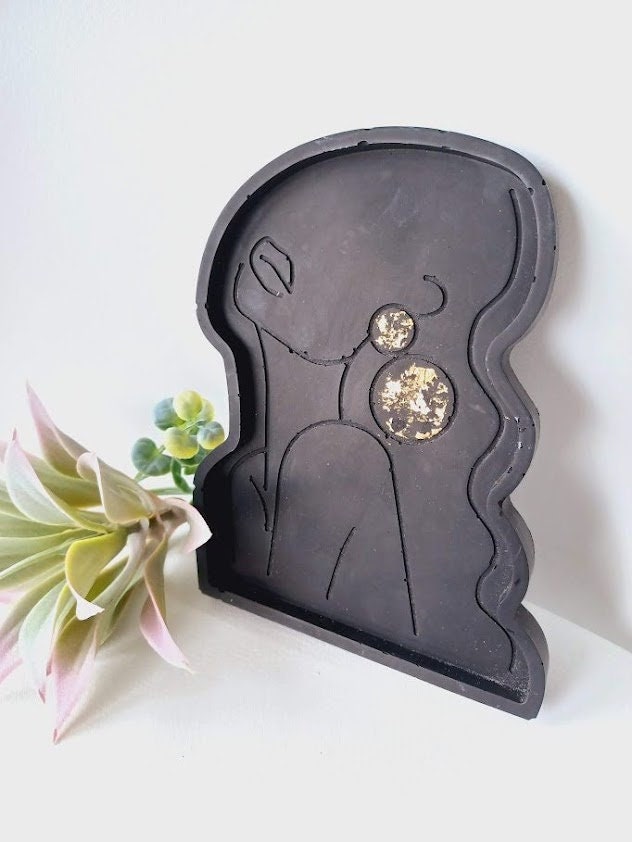 Range-bijoux "Femme" noir et or