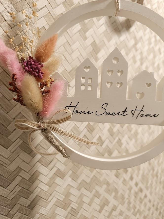 Décoration murale maisonnettes et fleurs séchées