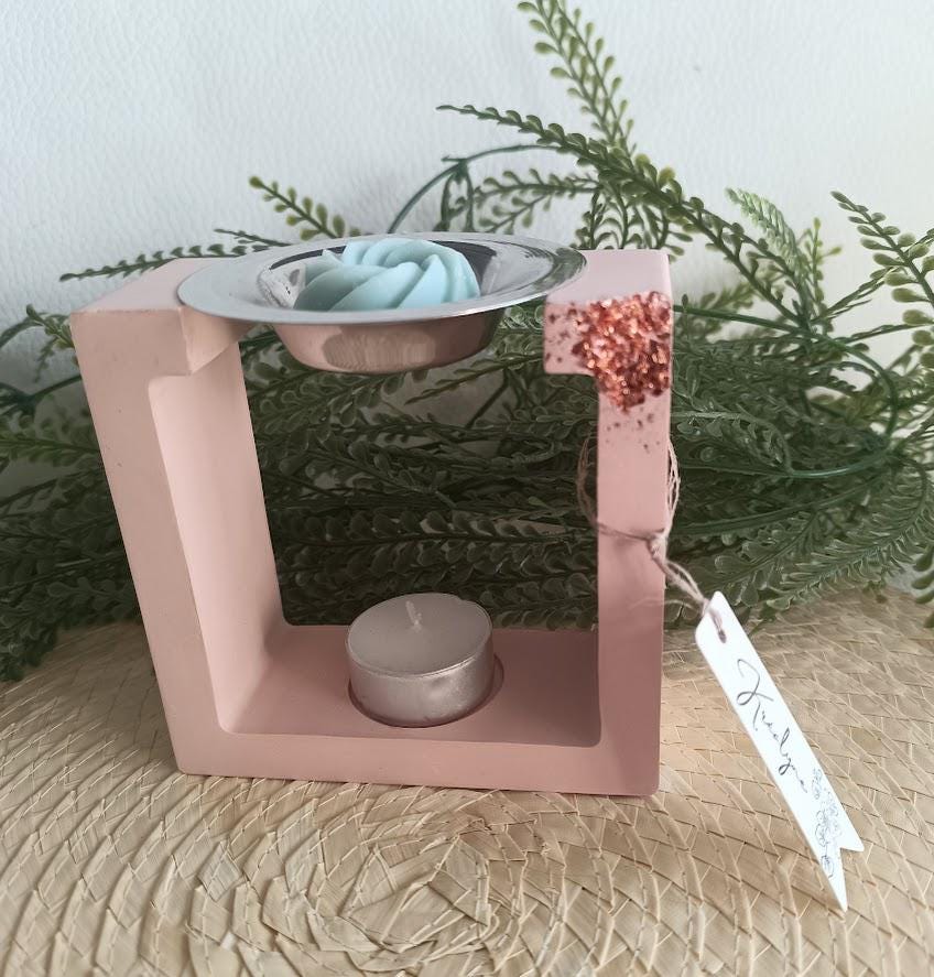 Brûle parfum carré terracotta clair et or rose.