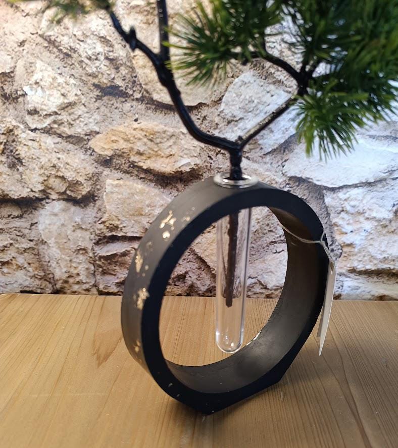 Vase soliflore noir et or.