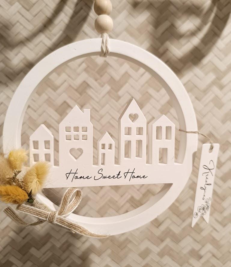 Décoration murale maisonnettes et fleurs séchées